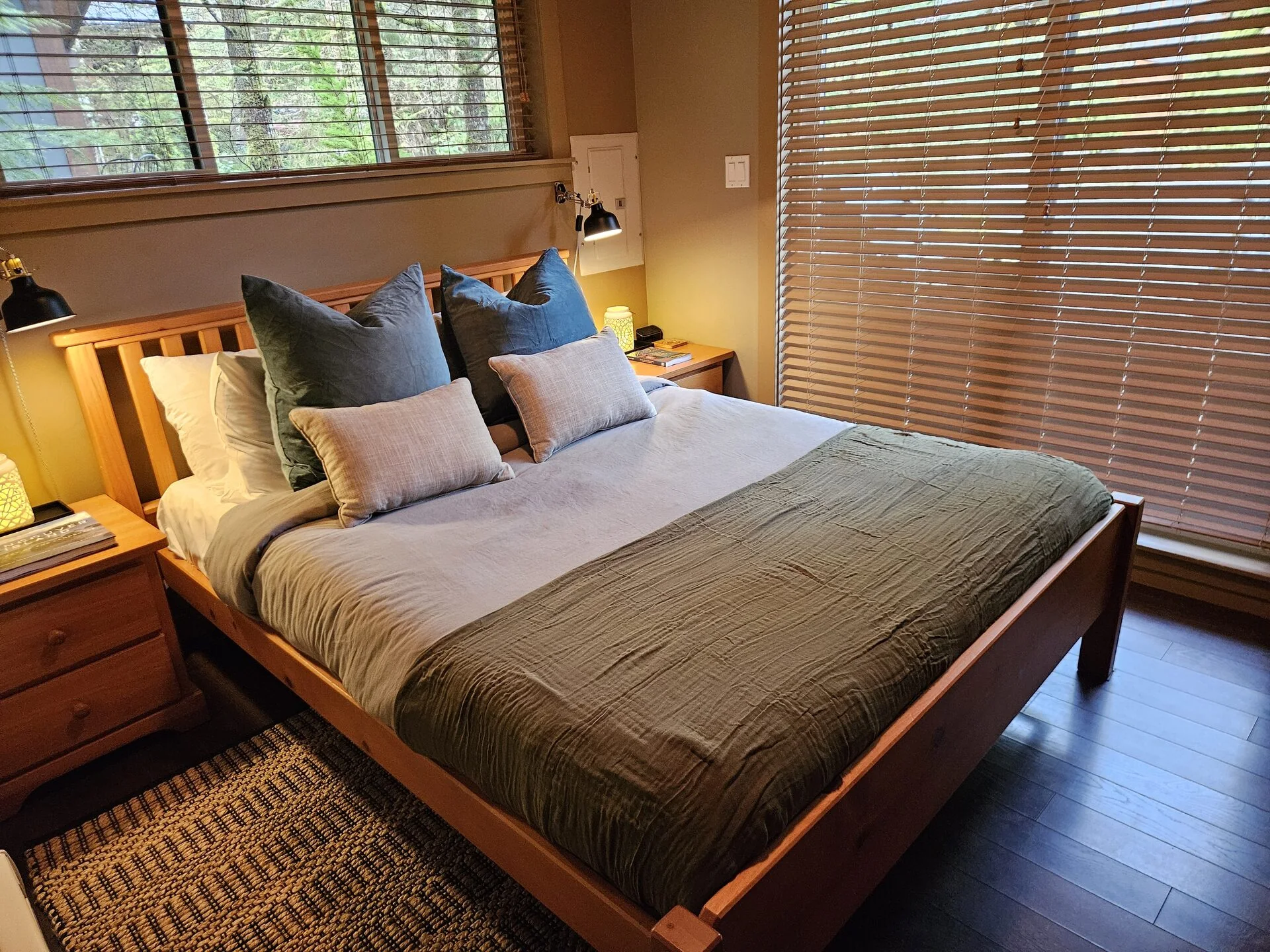 Cozy queen bedroom at Rachael's Retreat Port Renfrew cabin rental