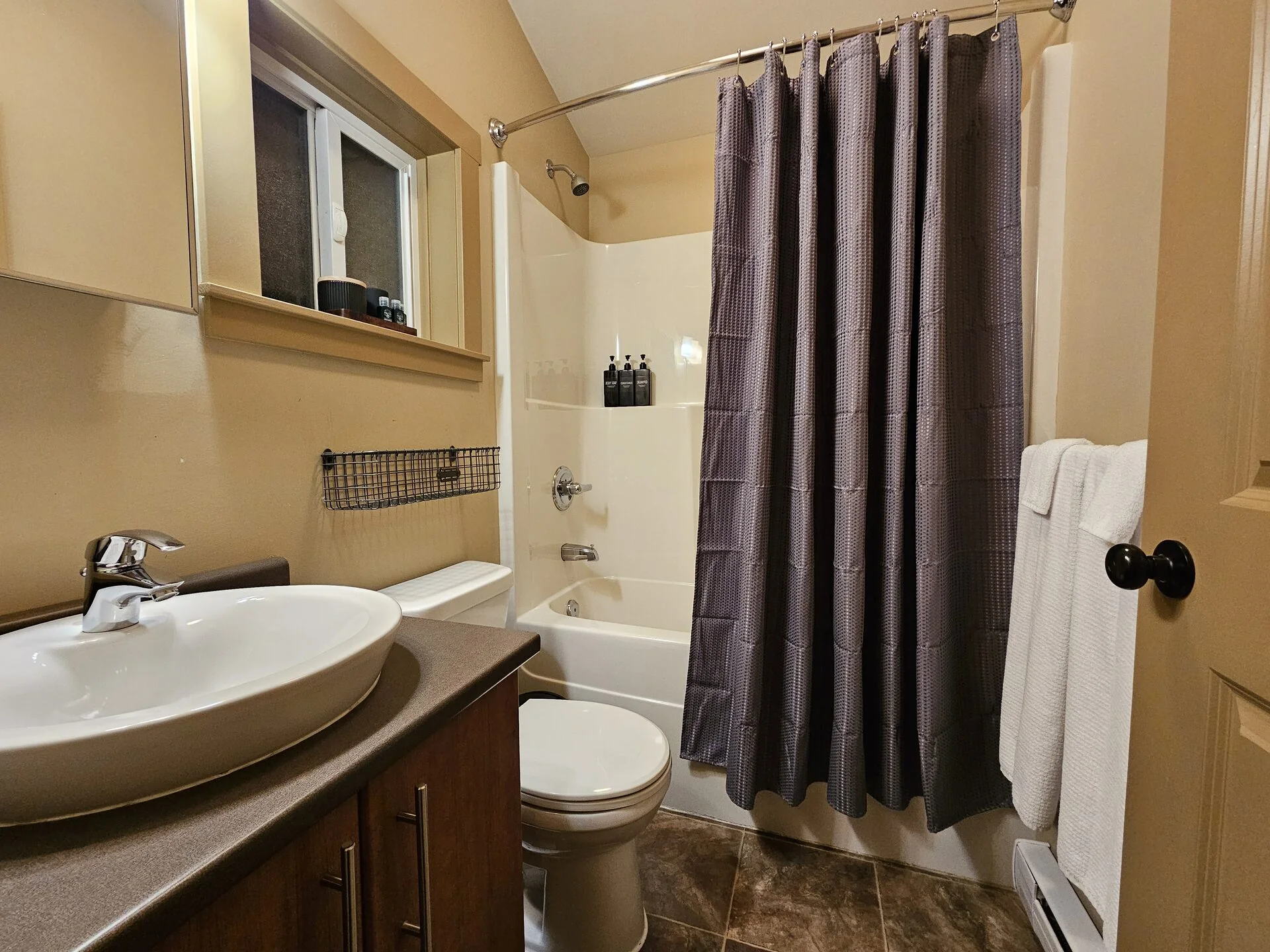Full bathroom with bathtub at Rachael's Retreat Port Renfrew